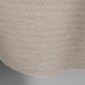 Brown and white linen cotton fabric in a herringbone pattern edge