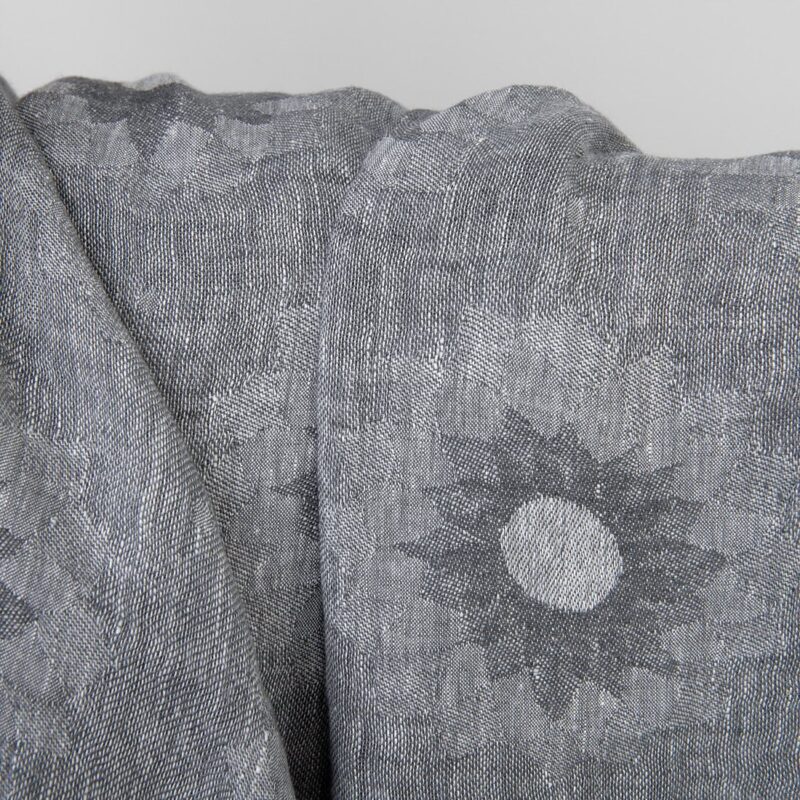 Grey linen fabric with floral pattern washed