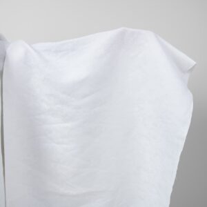 Optical white linen cotton fabric with flower ornaments