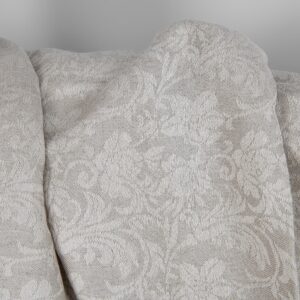 Undyed linen and white cotton fabric with flowers texture