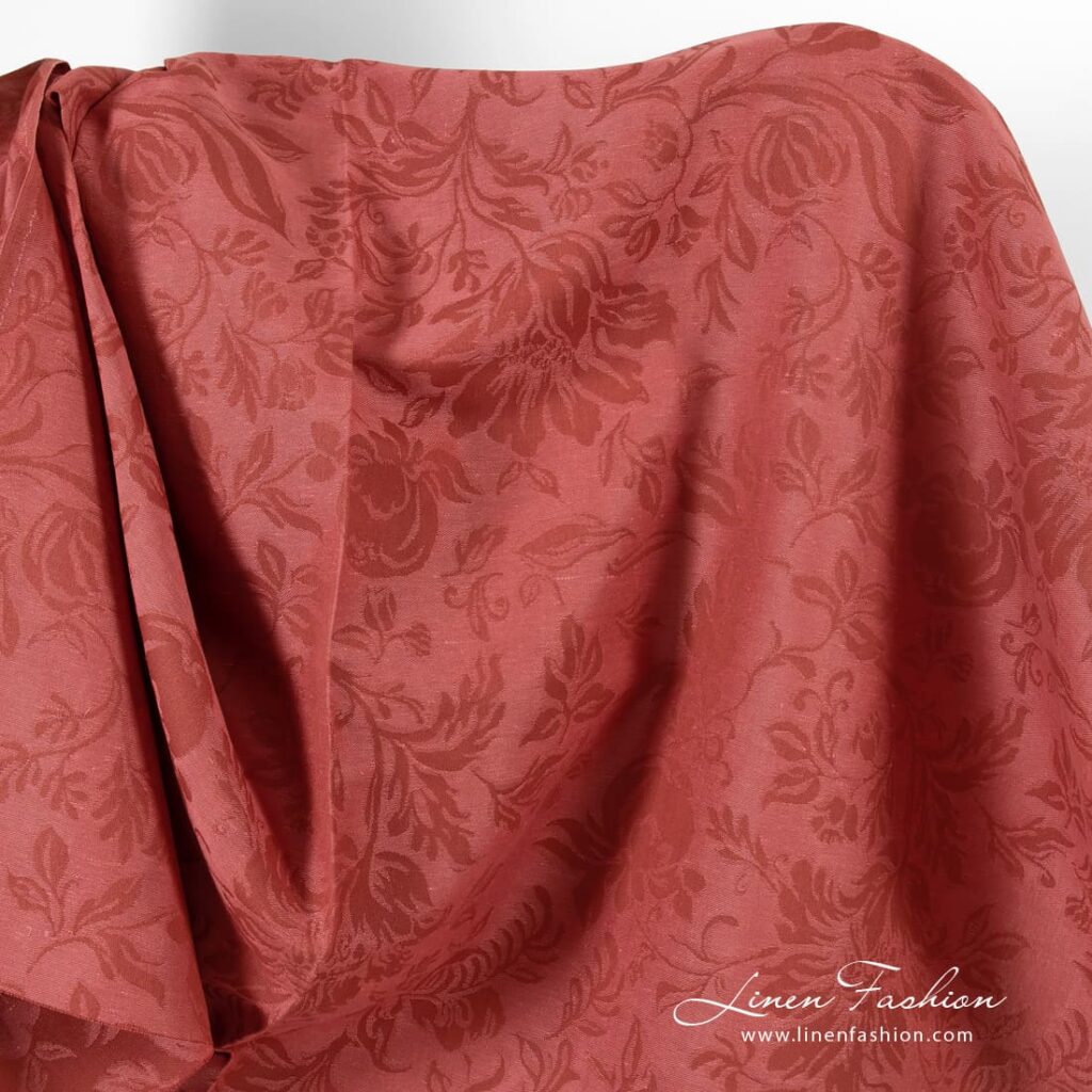 Red linen cotton fabric in floral pattern