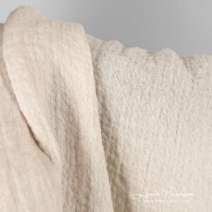 Light cream linen fabric in rhombus, washed