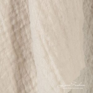 Light cream linen fabric in rhombus, specially washed to increase softness