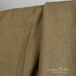 Linen fabric in tobacco green, specially washed to increase softness