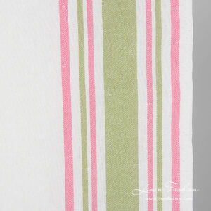Pink and green stripes of the narrow linen fabric