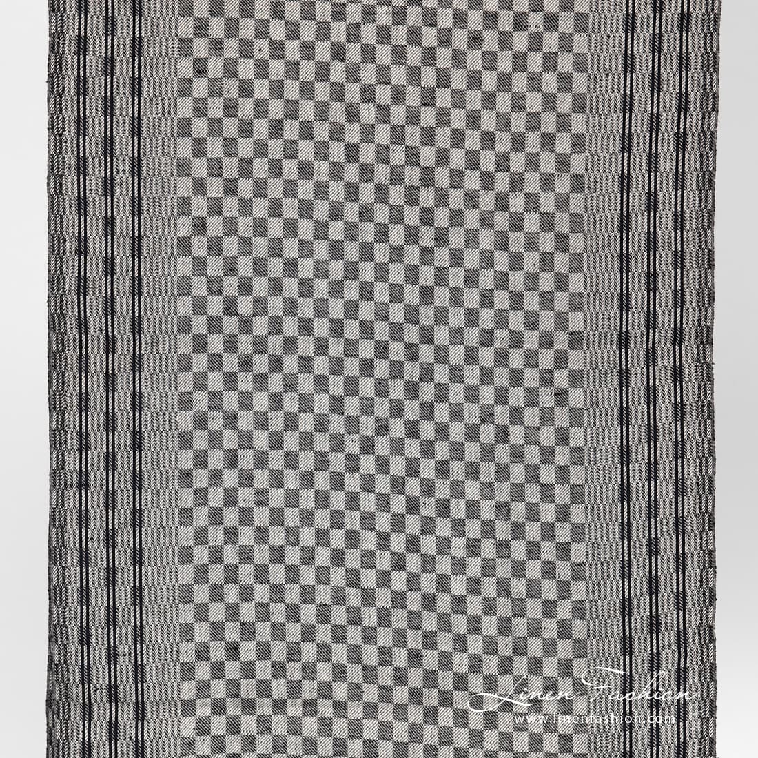 Narrow linen cotton fabric in black checks.