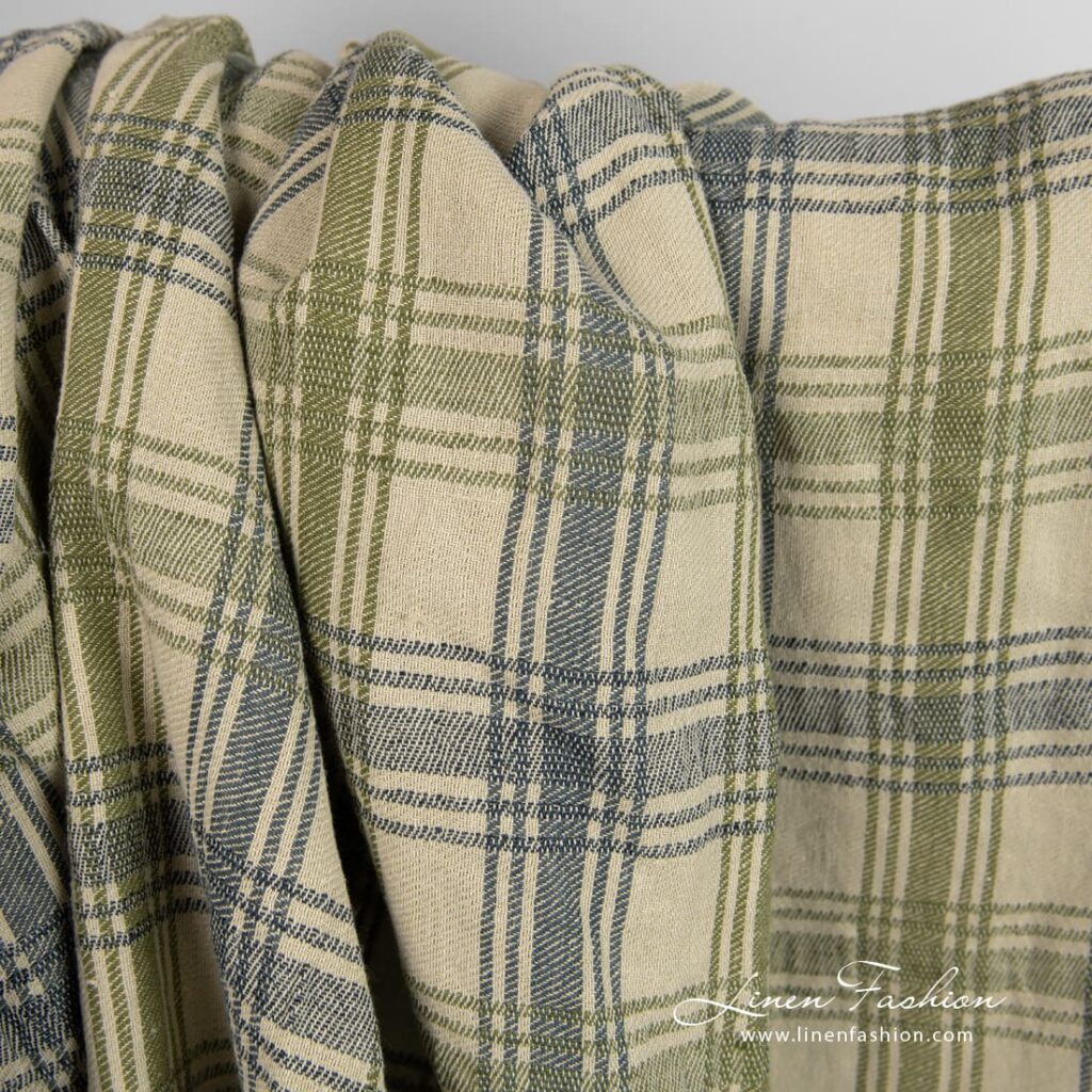 Linen cotton fabric woven from green and dark blue yarns