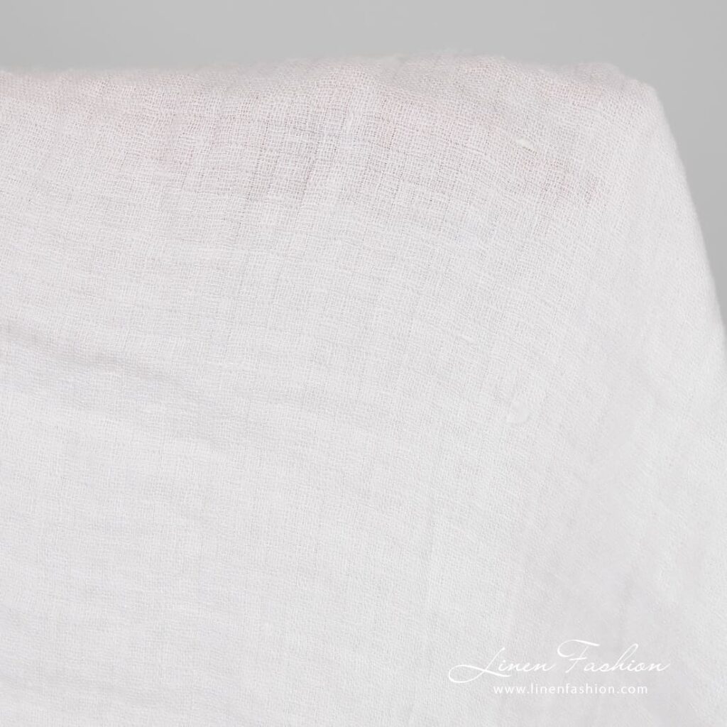 White linen fabric in checks, washed