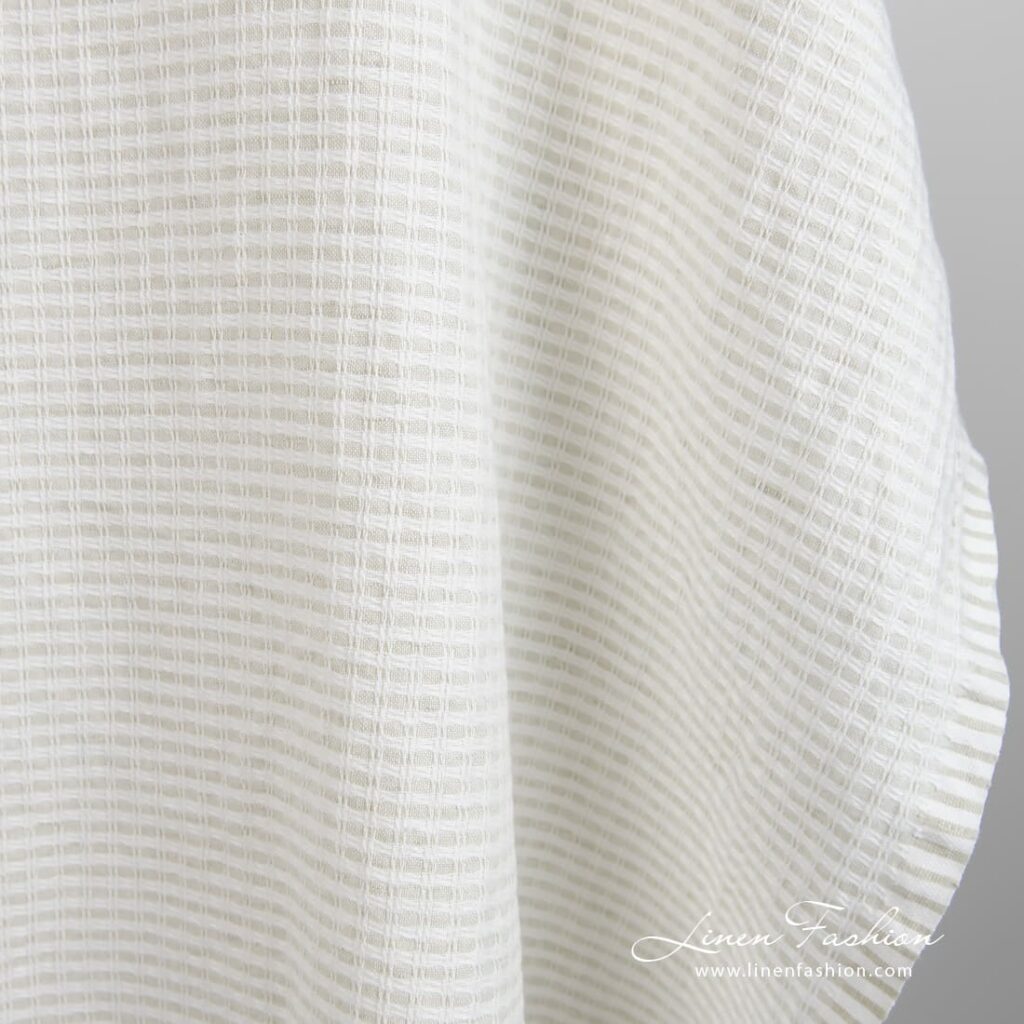 Light grey linen cotton fabric in checks, perfect for clothes and home textile