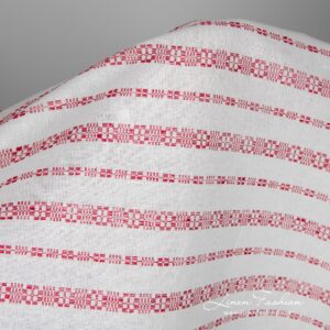 White linen-cotton fabric in red patterned stripes for sewing tablecloths, napkins, curtains, clothes