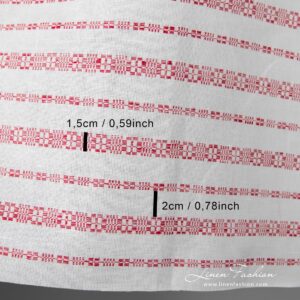 White linen-cotton fabric with horizontal red patterned stripes, woven in traditional folk geometric ornaments