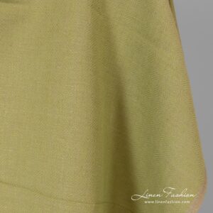 Diamond patterned green grey fabric.