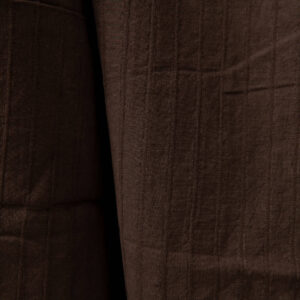 Dark brown washed linen cotton fabric close up detail
