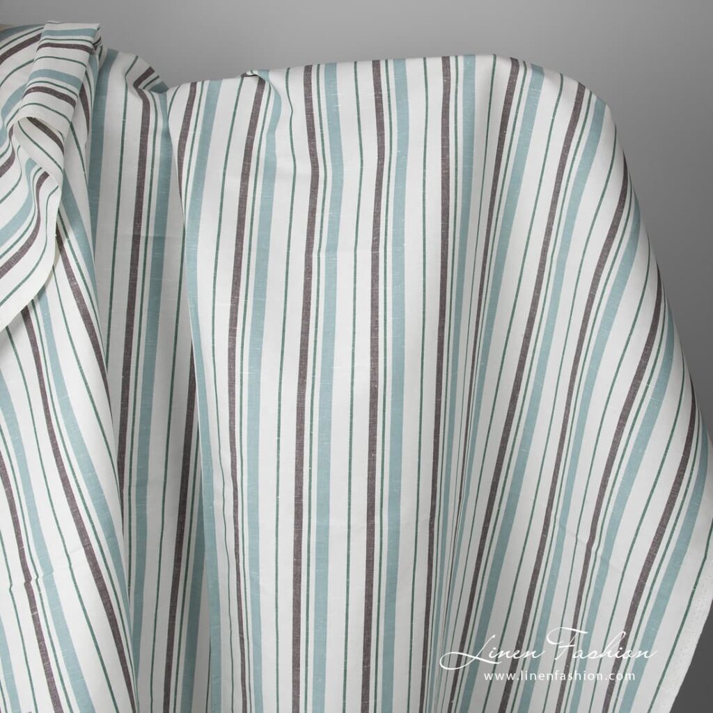 White fabric with blue, green and brown stripes