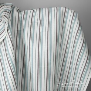 White fabric with blue, green and brown stripes
