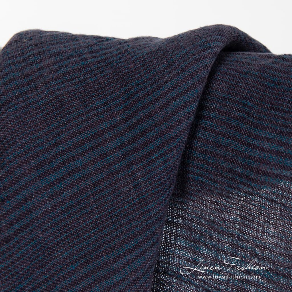 Washed striped purple linen fabric.