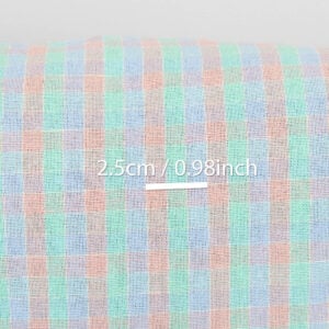 Ľanovo-bavlnená tkanina jasné pastelové kocky, praná