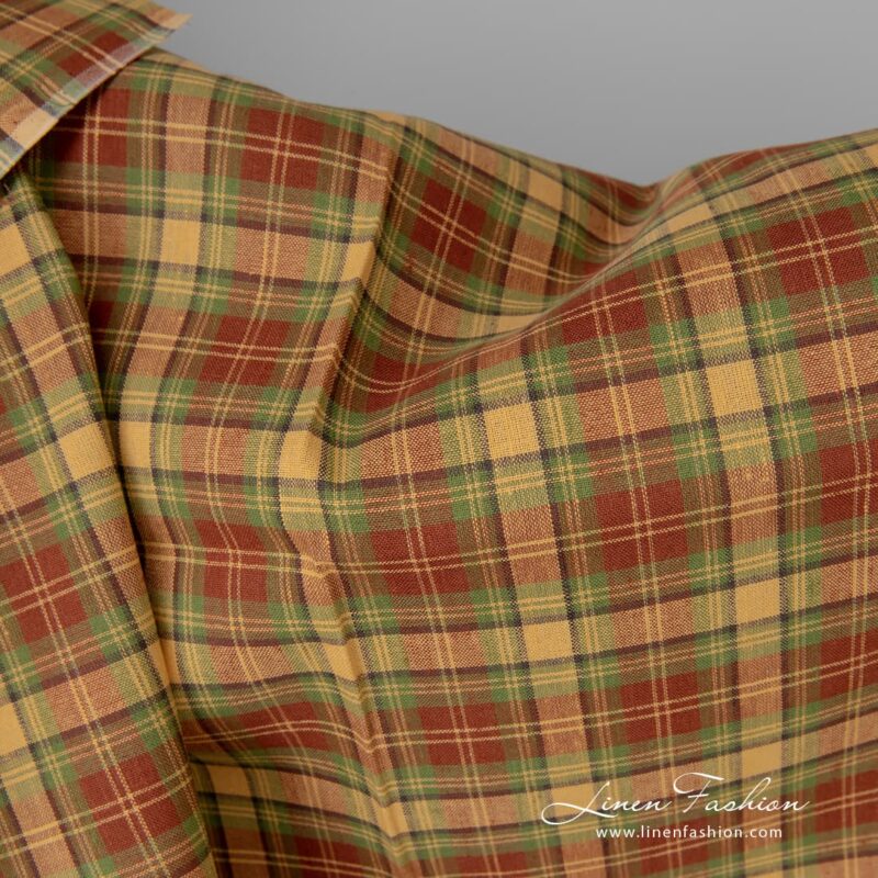 Linen cotton fabric in red, green and yellow checks suitable for playful design items (clothing, bedding, curtains, tablecloths, etc.).