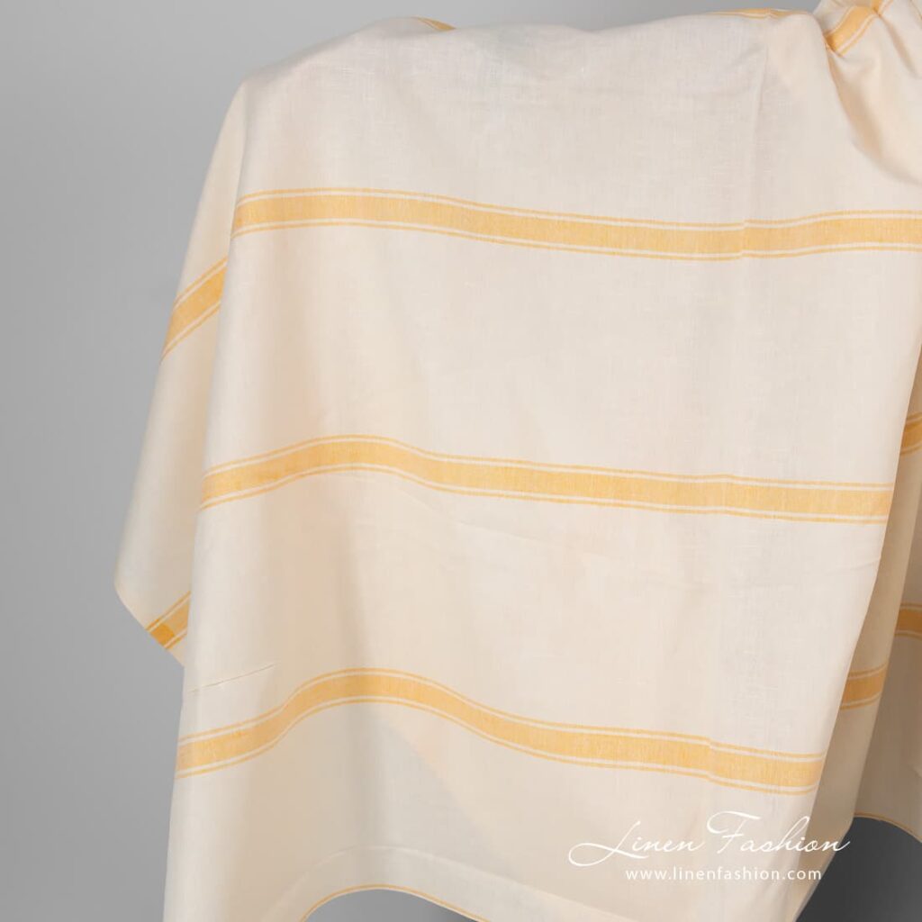 Cream colour striped linen cotton fabric.