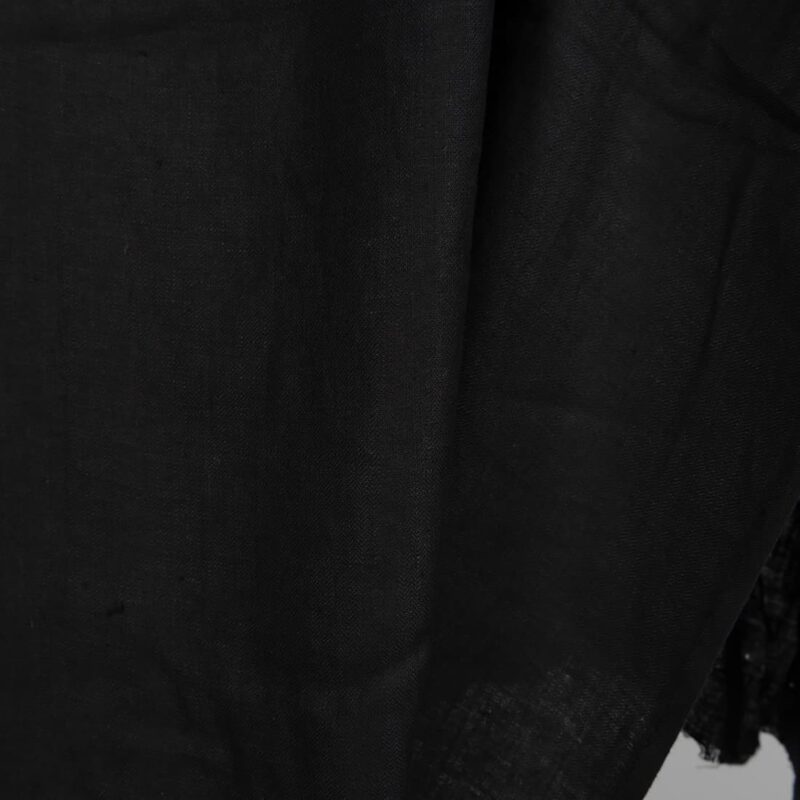 Black washed linen fabric in herringbone close up detail