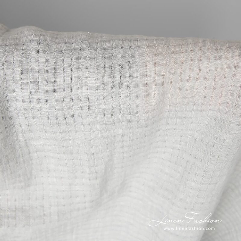 Light grey linen fabric with openwork stripes, which forms 1cm x 1cm (0.39”x0.39”) size checks