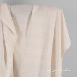 Yellow linen fabric in pink stripes