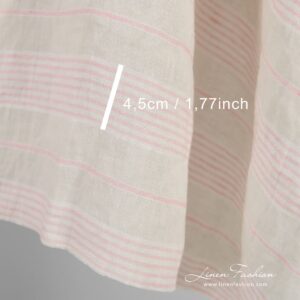 Yellow linen fabric in pink stripes, perfect for clothes and home textile
