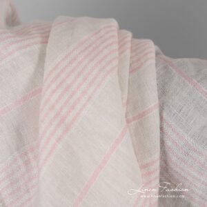 Yellow linen fabric in pink stripes, washed