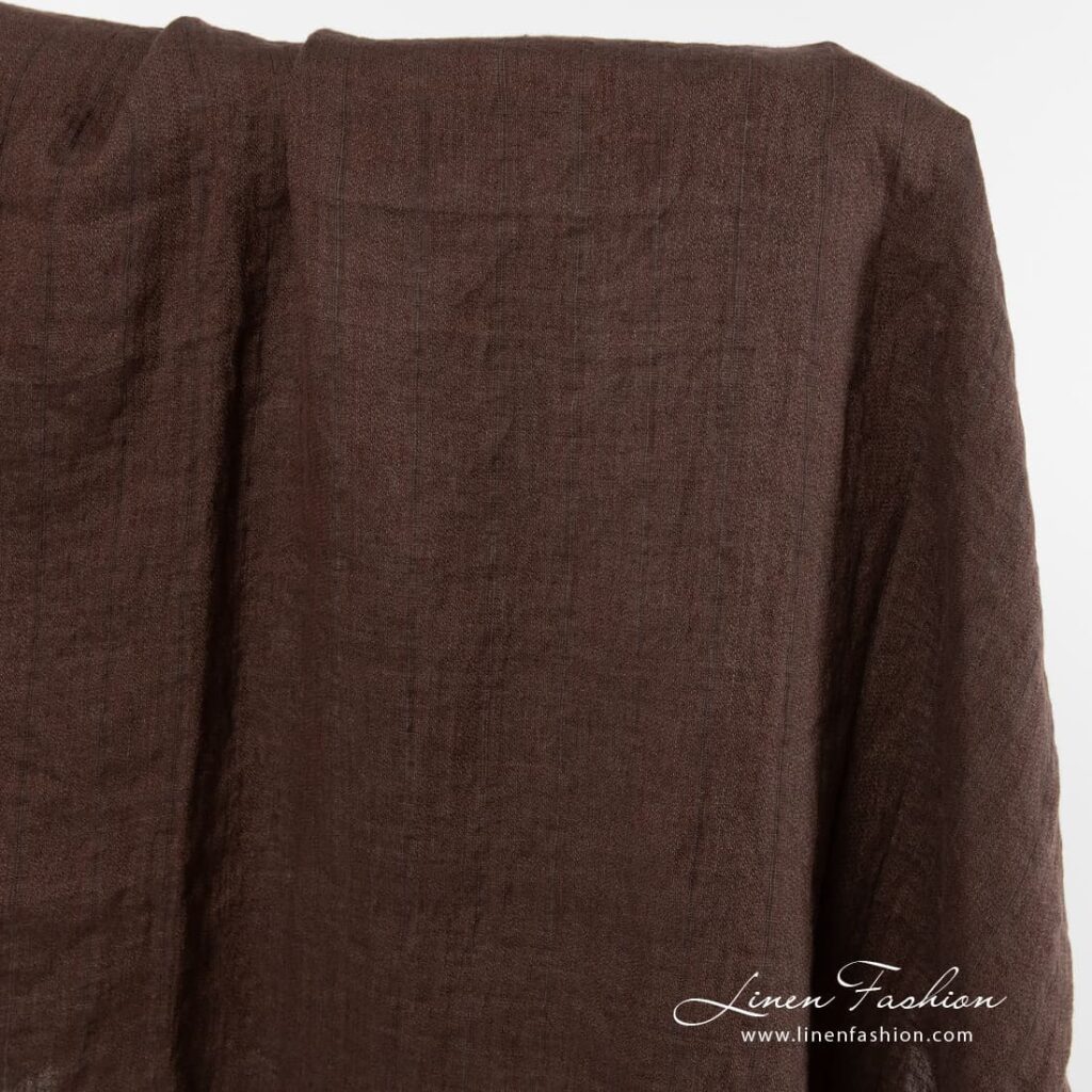 Washed linen fabric in brown colour.