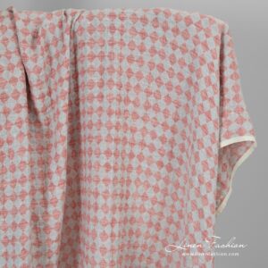 Linen cotton fabric in red rhombus washed.