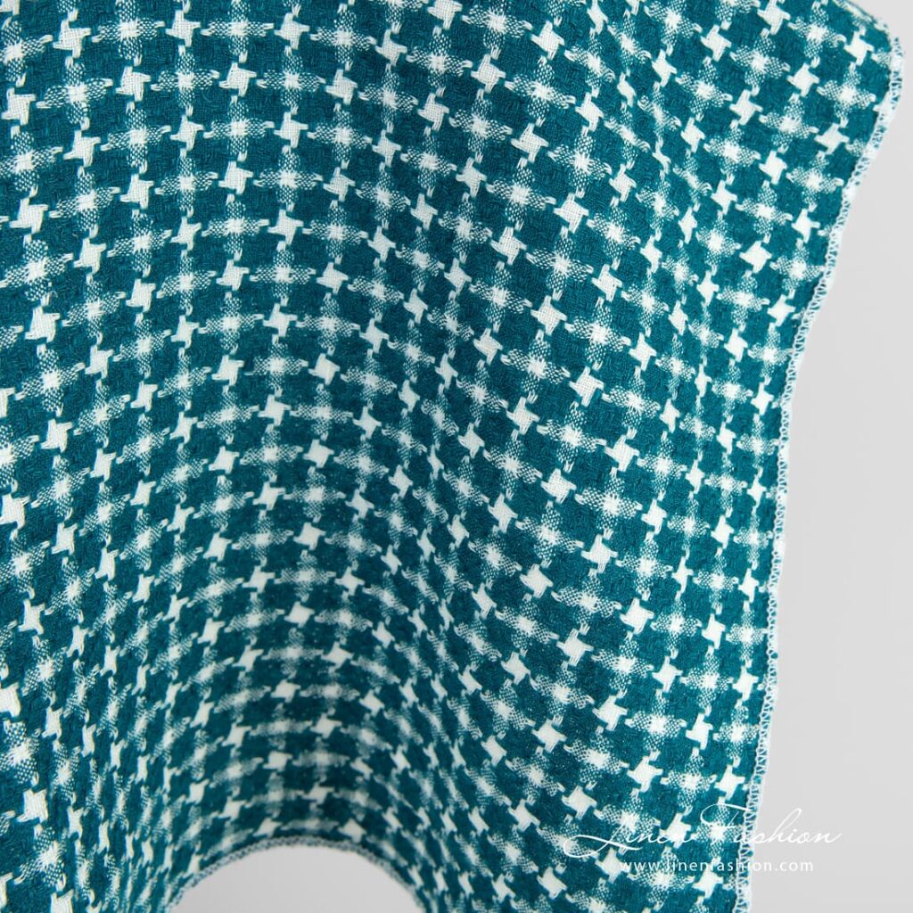 Linen fabric in dark turquoise and off-white color