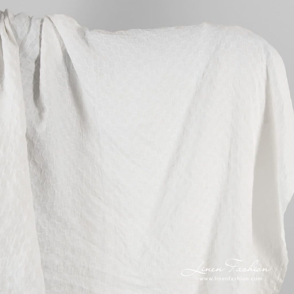 Optical white linen fabric in checks