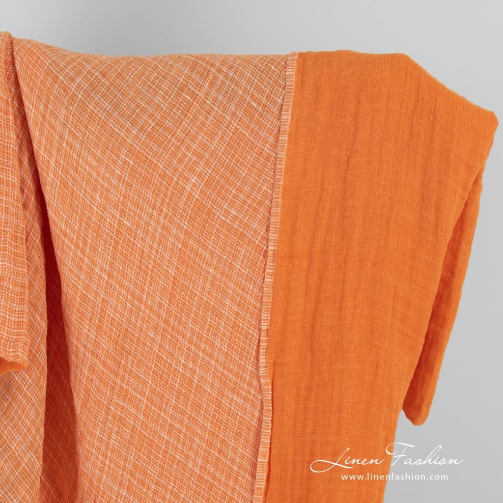 Double-sided orange linen fabric in checks