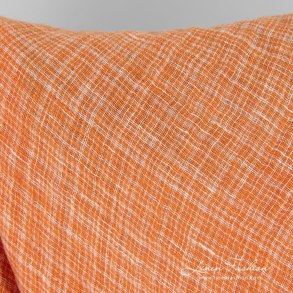 Double-sided orange linen fabric in checks, specially washed to increase softness