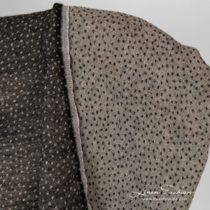 Black dotted fabric, linen-wool.