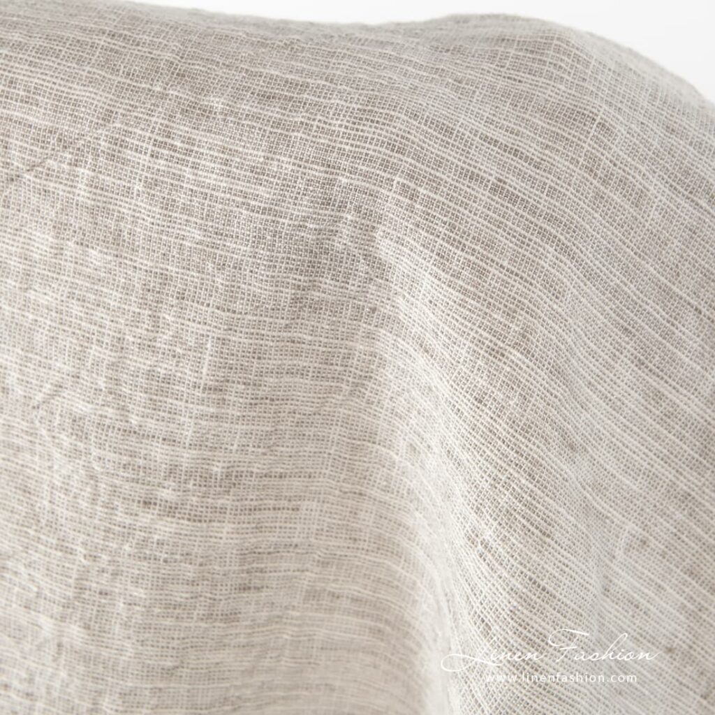 Grey-brownish wide linen-cotton fabric.