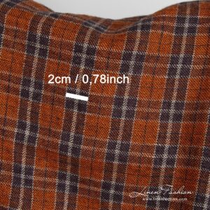 Linen wool fabric in orange and black checks