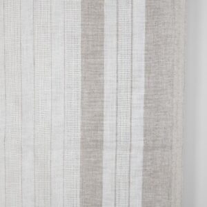 White linen fabric with undyed natural linen stripes close up photo