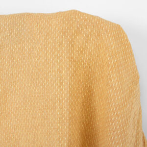 Ľanová látka svetložltá a tehlová bodkovaná, praná