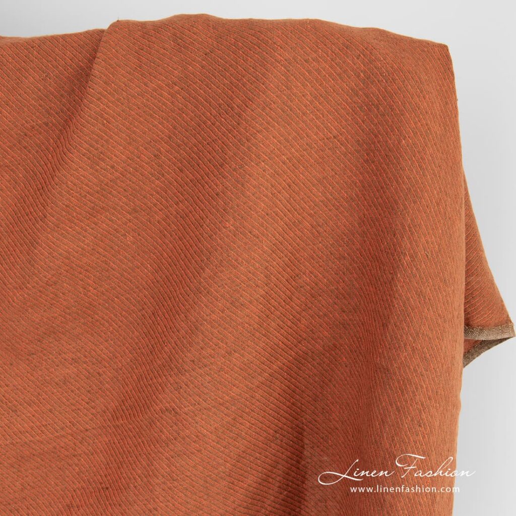 Linen fabric in orange and dark brown twills