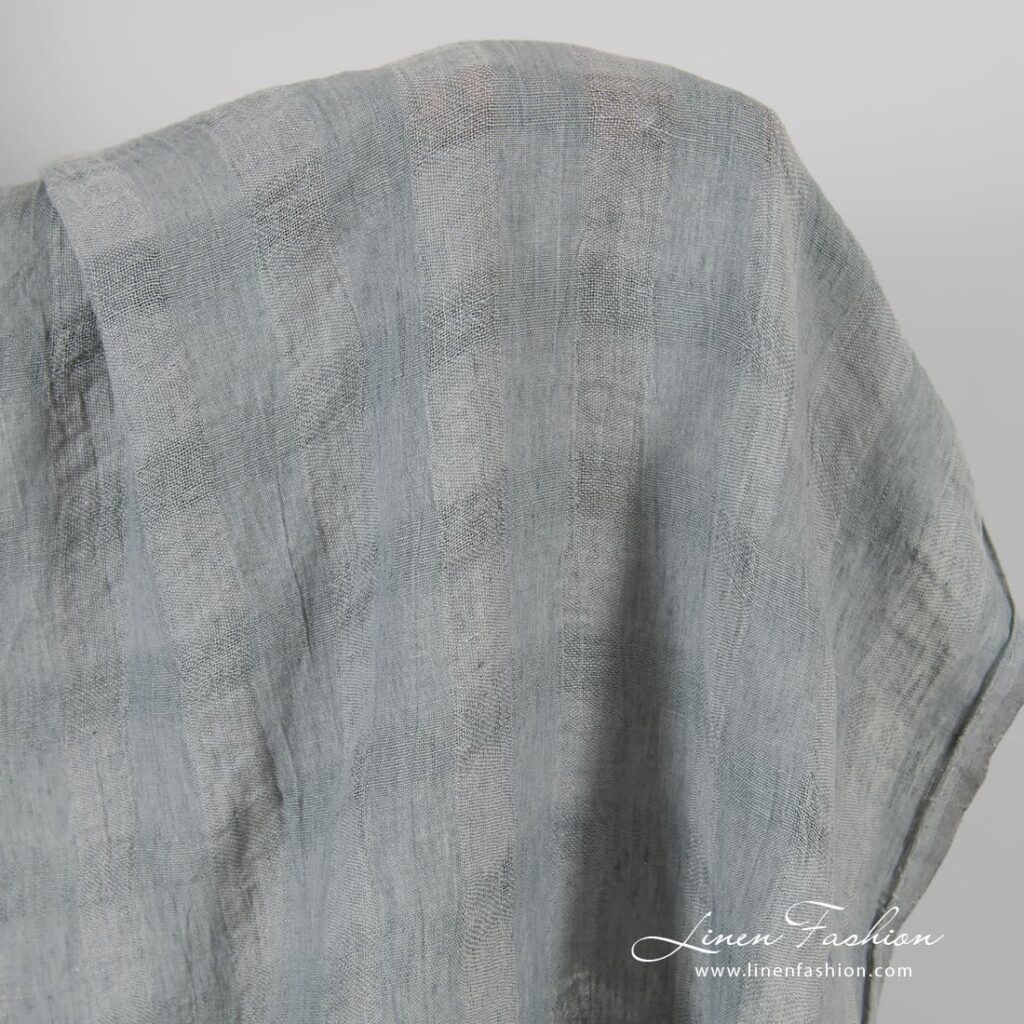 Transparent linen fabric in grey checks, specially washed