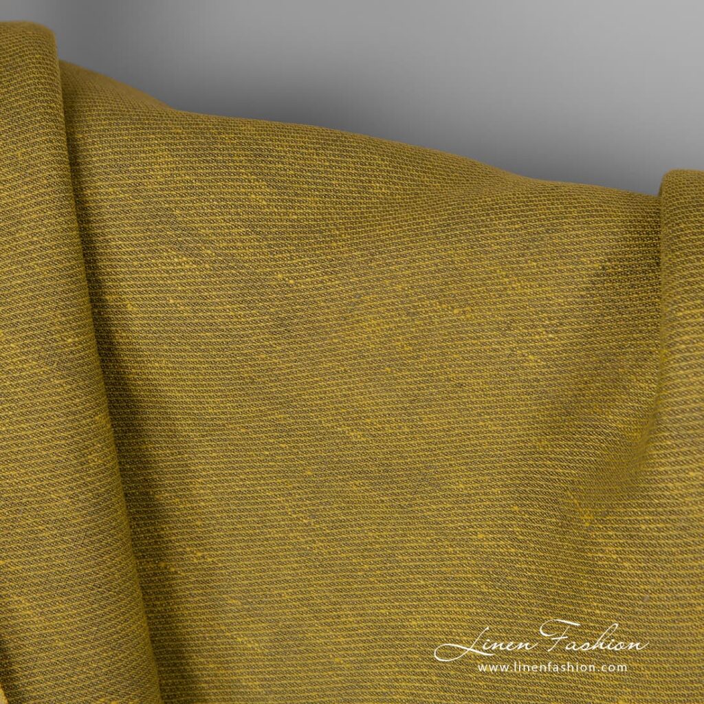 100% linen fabric in diagonal pattern, yellow-green.