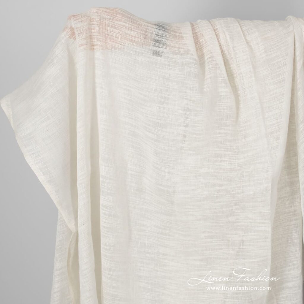 Off-white sheer linen / cotton fabric in stripes