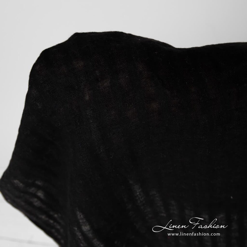 Striped black linen fabric.