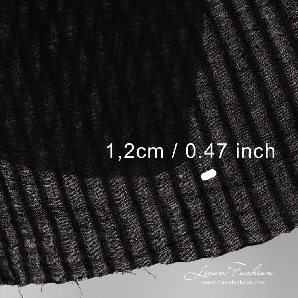 100% linen fabric in black colour.