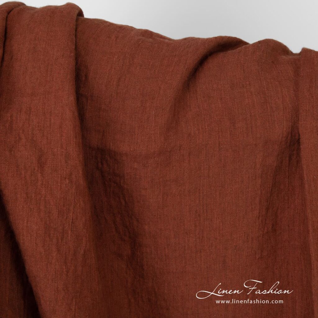 Cinnamon brown linen fabric with red tones