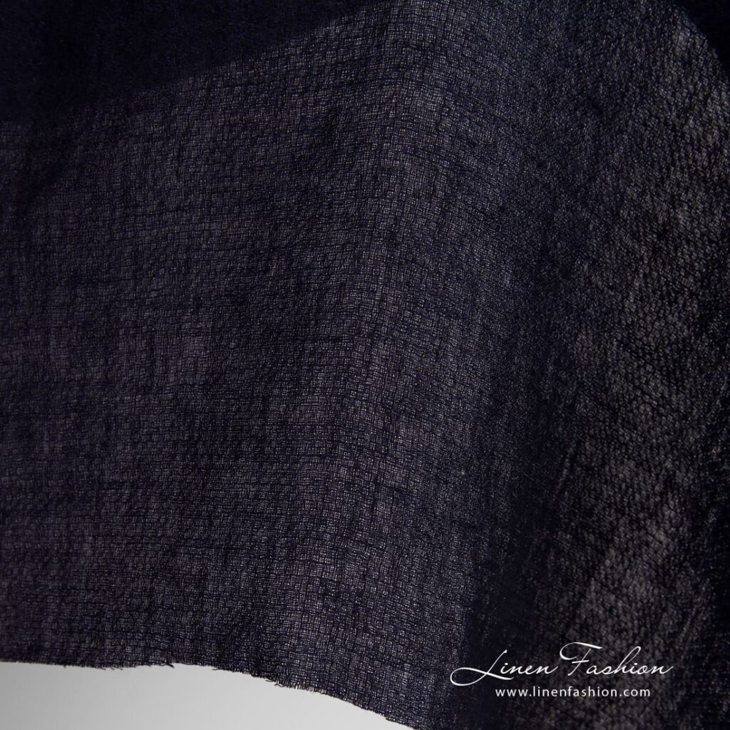 Dark blue linen fabric in dobby pattern, specially washed