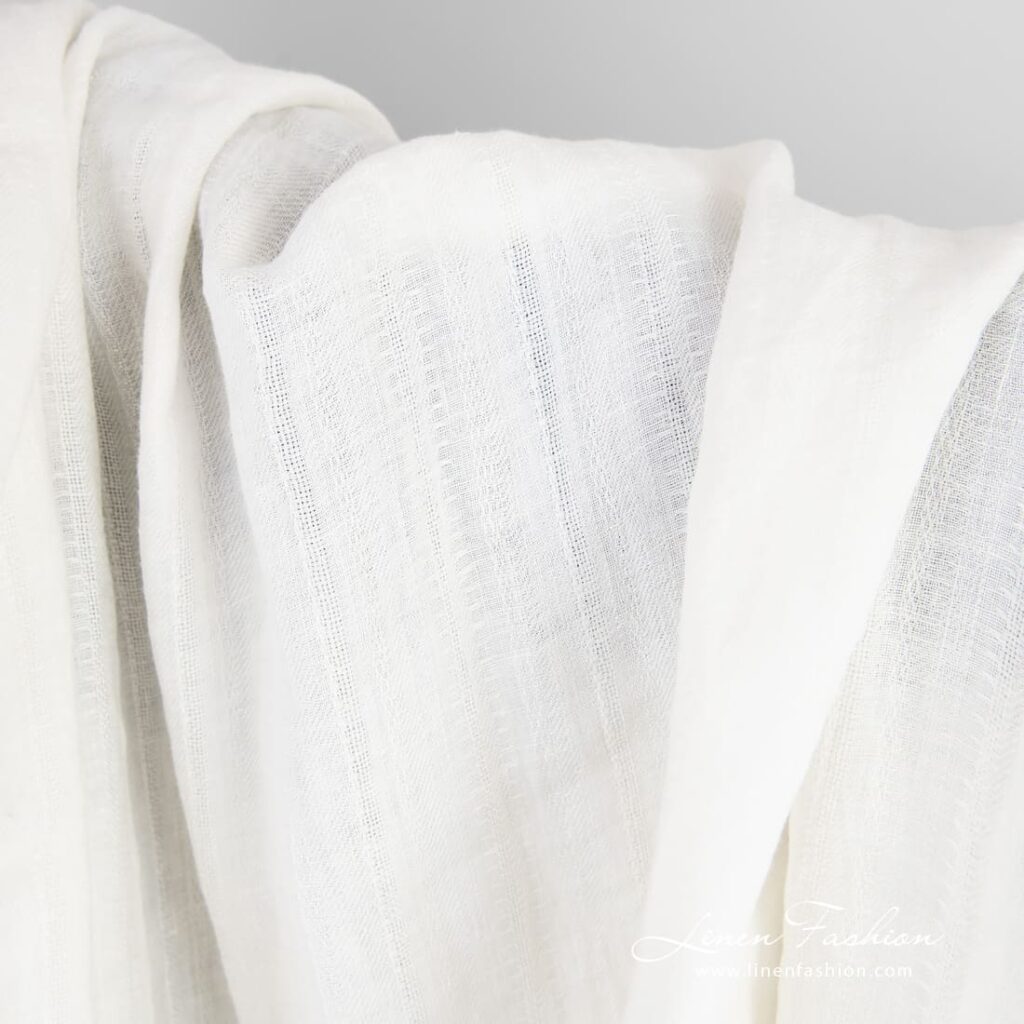 Off-white linen fabric with delicate stripes