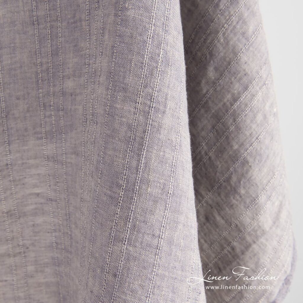 Linen fabric with vertical stripes and melange colors
