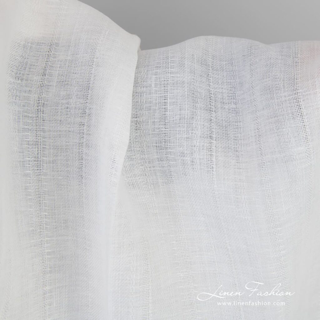 Off-white linen fabric in delicate vertical stripes